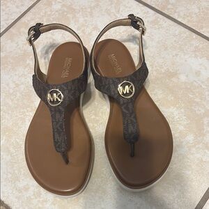 Michael Kors Brown T-Strap Sandals with Silver Medallion